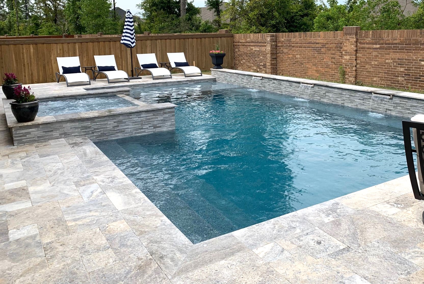 Custom Built Pool and Spa with Travertine Decking